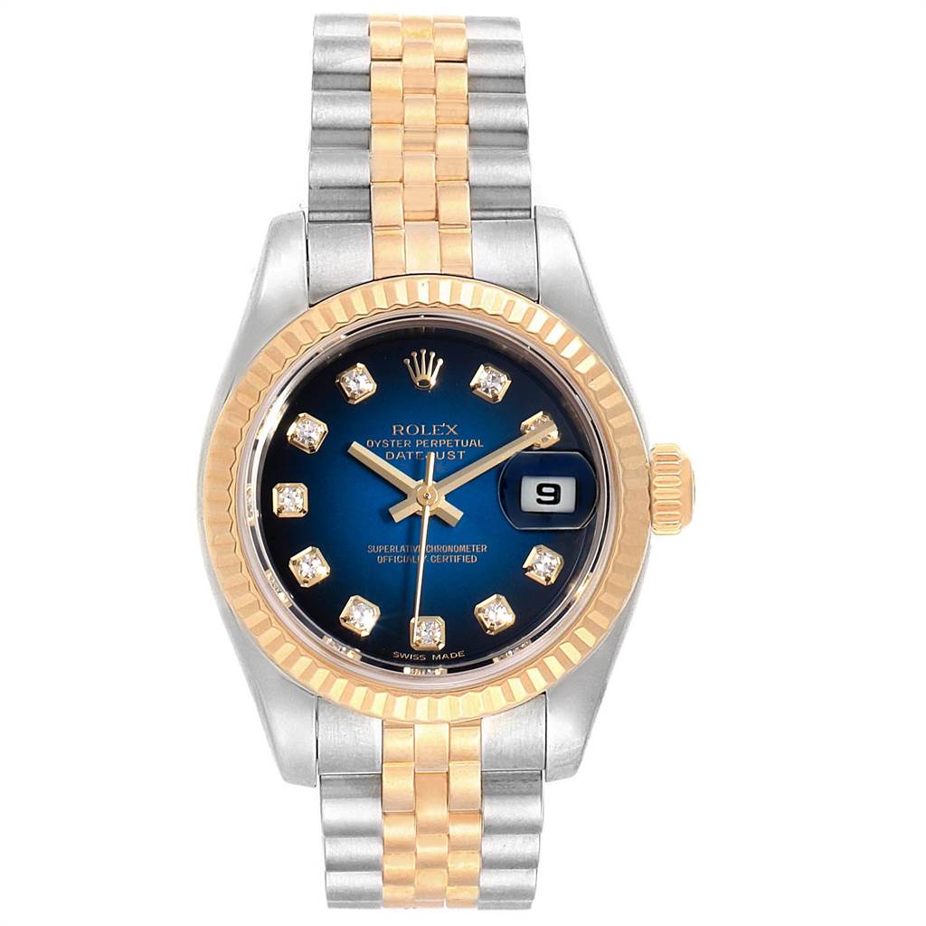 The image shows a frontal view of a Rolex Datejust 179173 Women
s Steel and Gold (two tone) Blue Dial 179173 Women
s Steel and Gold (two tone) Blue Dial watch with a two-tone bracelet, gold bezel, and blue dial with diamond markers.