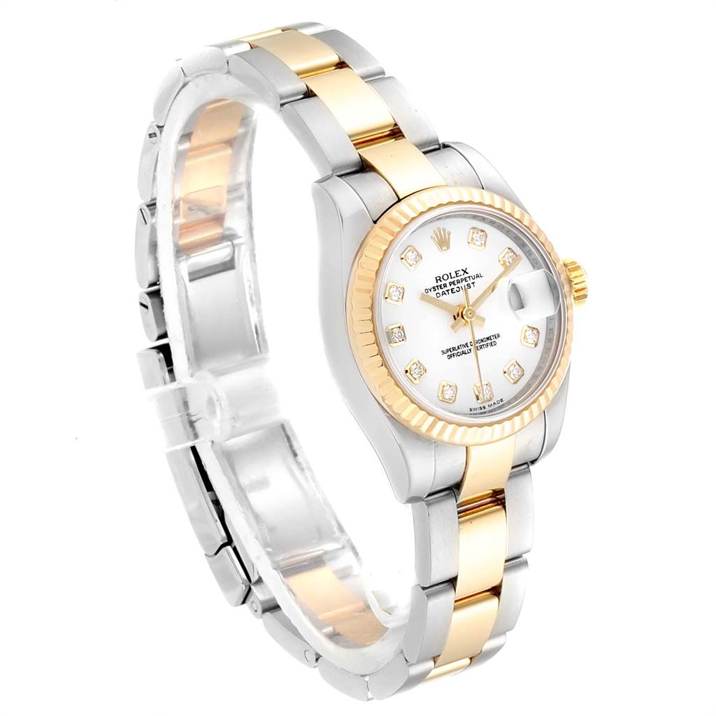 This image shows a Rolex Datejust 179173 Women's Steel and Gold (two tone) White Dial 179173 Women's Steel and Gold (two tone) White Dial watch, angled to display the face, bezel, and bracelet with clear visibility of its design elements.