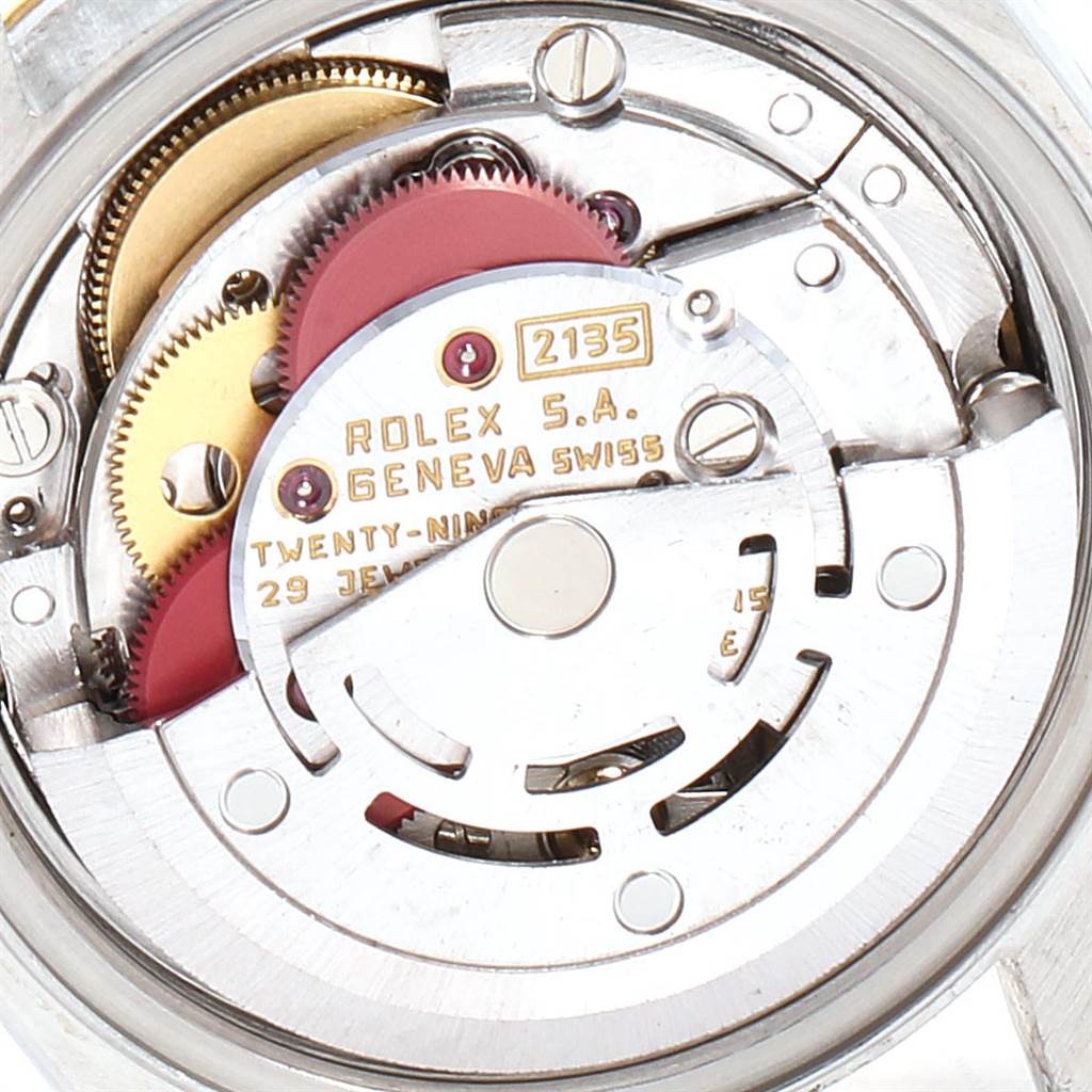 This image shows the internal mechanics of a Rolex Datejust 69173 Women's Stainless Steel White Dial 69173 Women's Stainless Steel White Dial watch, specifically the movement and gear components.