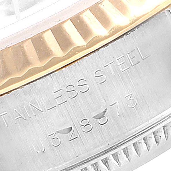 Close-up angle showing the fluted bezel and engraved serial number area of the Rolex Datejust 69173 Women's Stainless Steel White Dial 69173 Women's Stainless Steel White Dial watch.