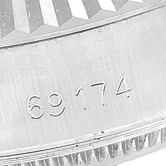 The image shows a close-up of the model number "69174" engraved on the case side of a Rolex Datejust 69174 Women's Stainless Steel Beige Dial 69174 Women's Stainless Steel Beige Dial watch.