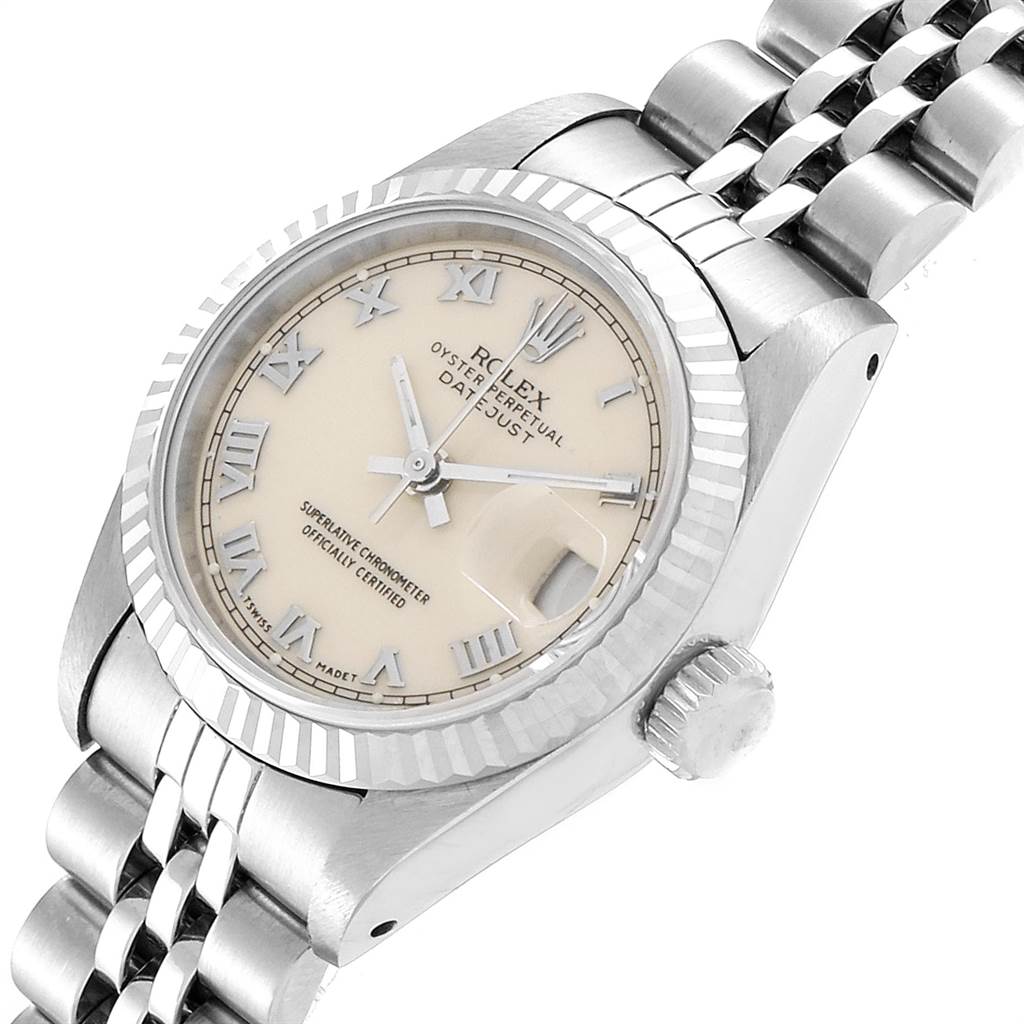 The image shows a Rolex Datejust 69174 Women's Stainless Steel Beige Dial 69174 Women's Stainless Steel Beige Dial watch at a three-quarter angle, highlighting the face, bezel, crown, and partial bracelet.