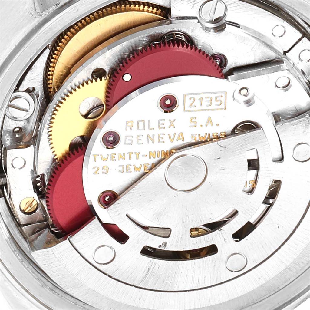 This image shows a close-up of the movement mechanism of a Rolex Datejust 69174 Women's Stainless Steel Beige Dial 69174 Women's Stainless Steel Beige Dial watch.