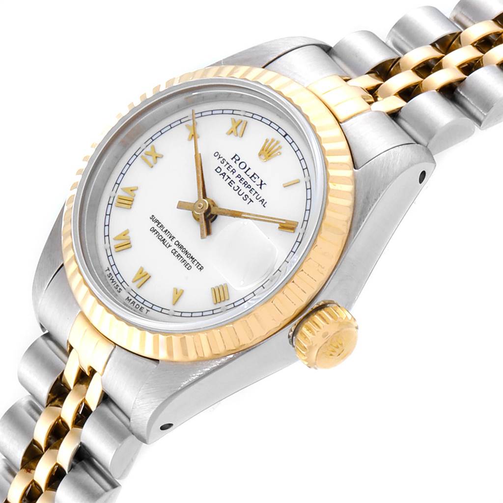 This Rolex Datejust 69173 Women
s Stainless Steel White Dial 69173 Women
s Stainless Steel White Dial watch is captured at an angle showing the dial, crown, bezel, and bracelet.