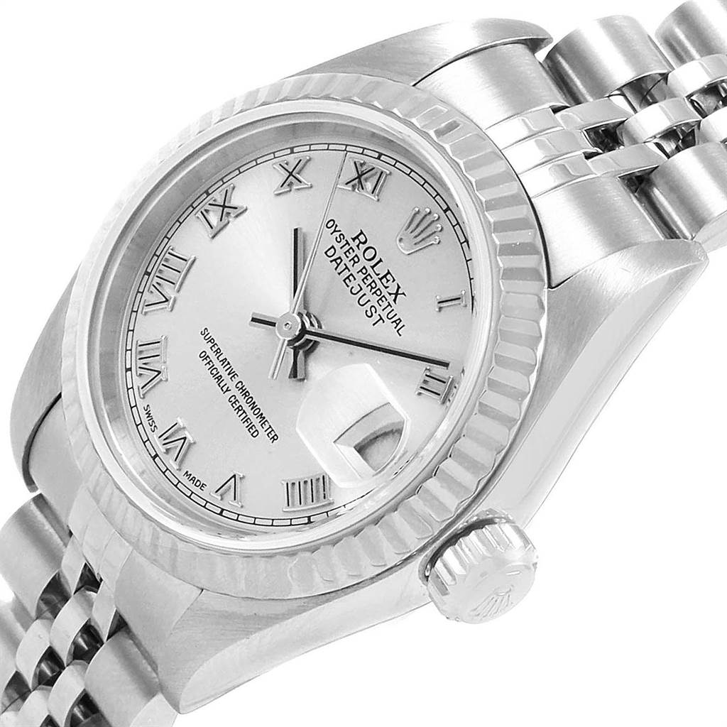 The image shows a close-up, angled view of the Rolex Datejust 79174 Women
s Stainless Steel Silver Dial 79174 Women
s Stainless Steel Silver Dial, highlighting its face, crown, and part of the bracelet.