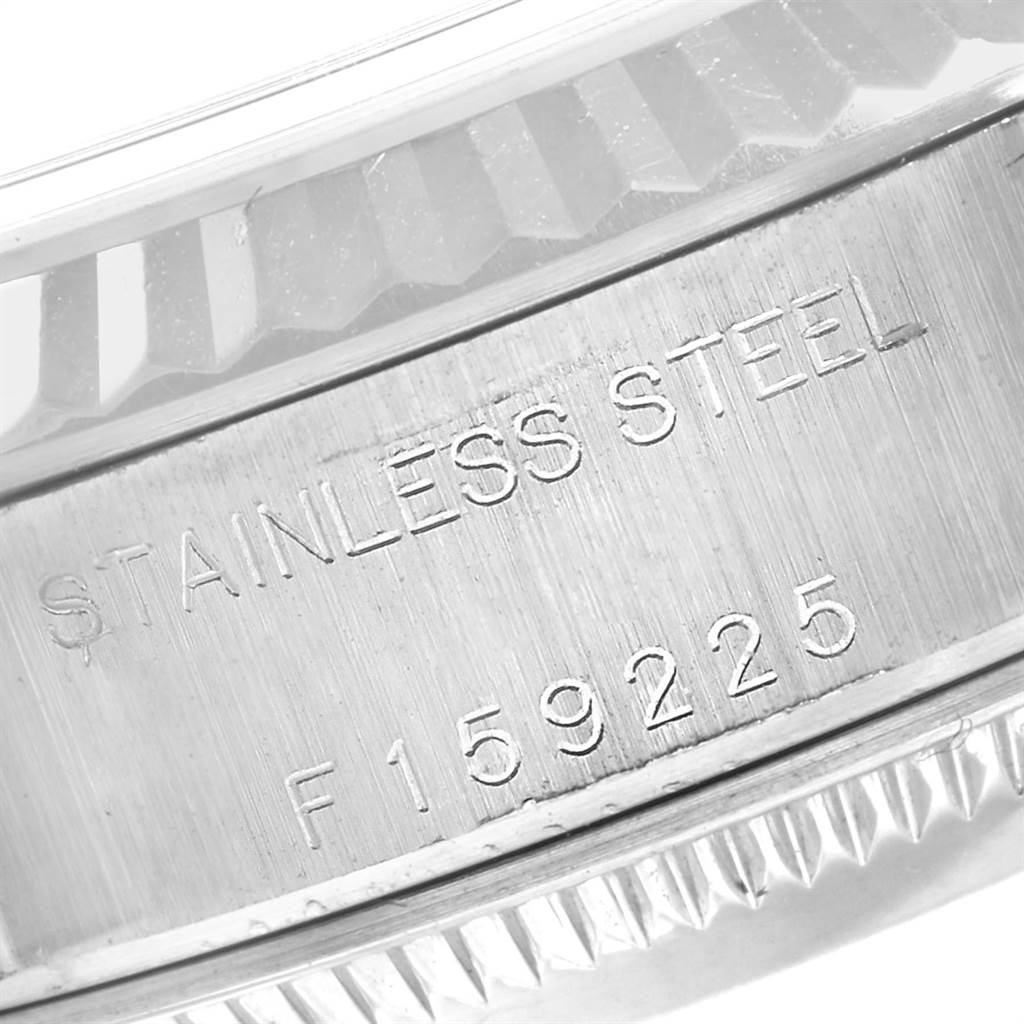 The image shows a close-up of the stainless steel case with the serial number on a Rolex Datejust 79174 Women
s Stainless Steel Silver Dial 79174 Women
s Stainless Steel Silver Dial watch.