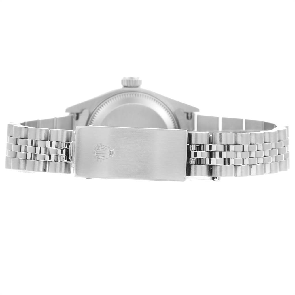 The image shows the back angle of a Rolex Datejust 79174 Women's Stainless Steel Blue Dial 79174 Women's Stainless Steel Blue Dial watch, featuring its clasp and bracelet.