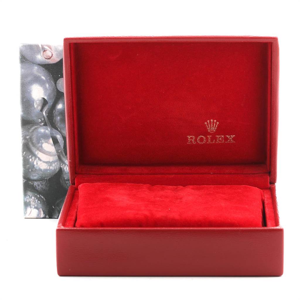 This image shows an open red Rolex watch box for the Datejust model, featuring the brand logo inside.