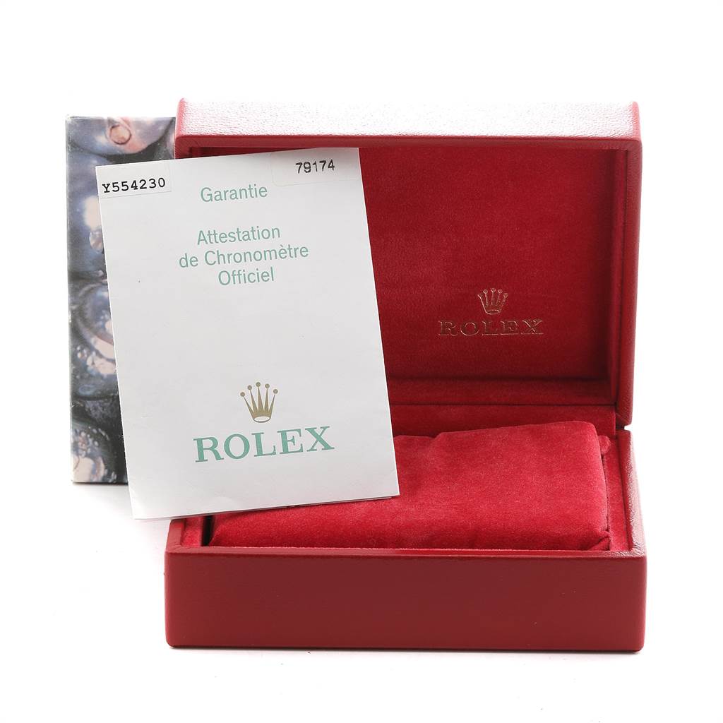 The image shows a red Rolex watch box for a Datejust model with warranty documents.