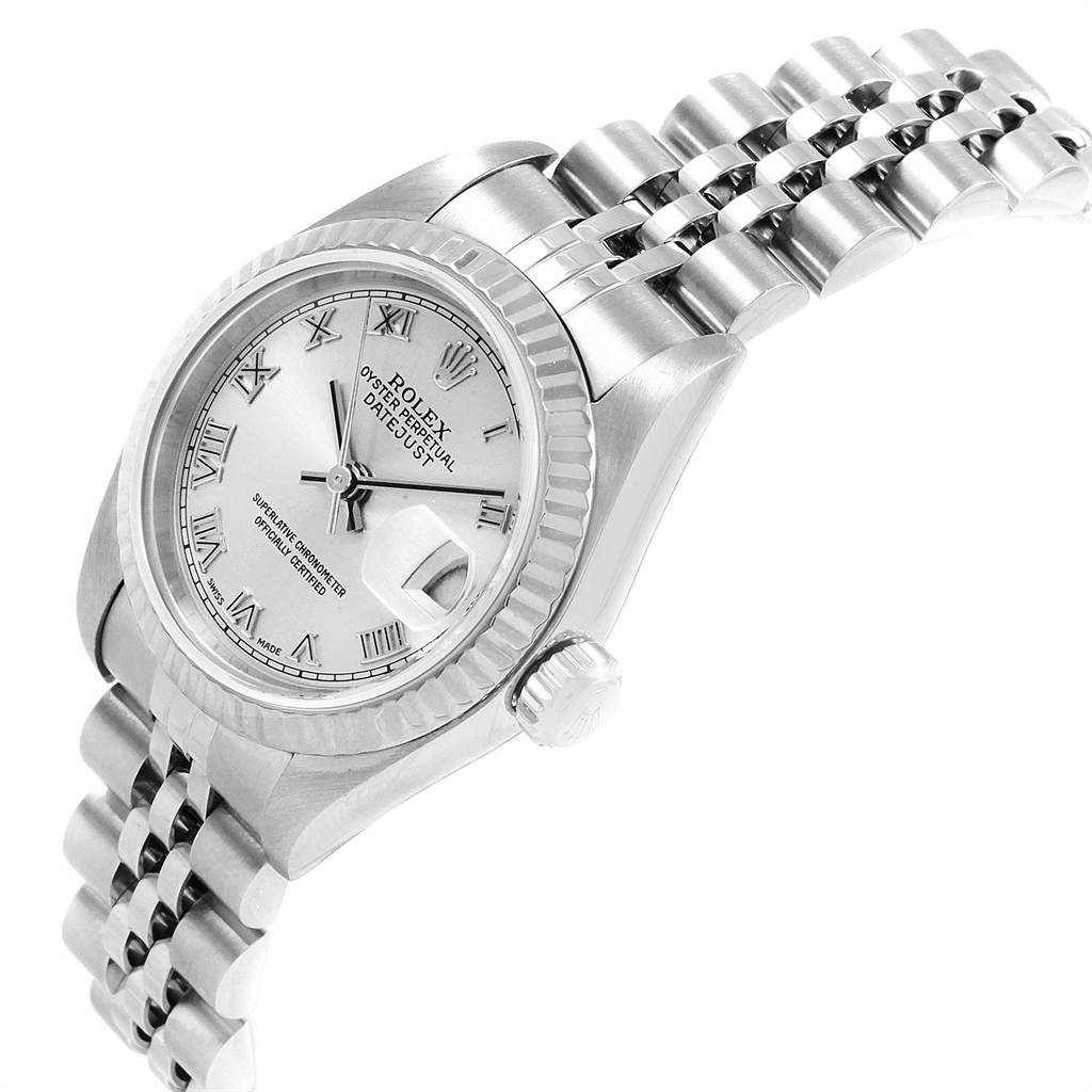 This image shows a Rolex Datejust 79174 Women
s Stainless Steel Silver Dial 79174 Women
s Stainless Steel Silver Dial watch in a side angle featuring the dial, crown, and part of the bracelet.