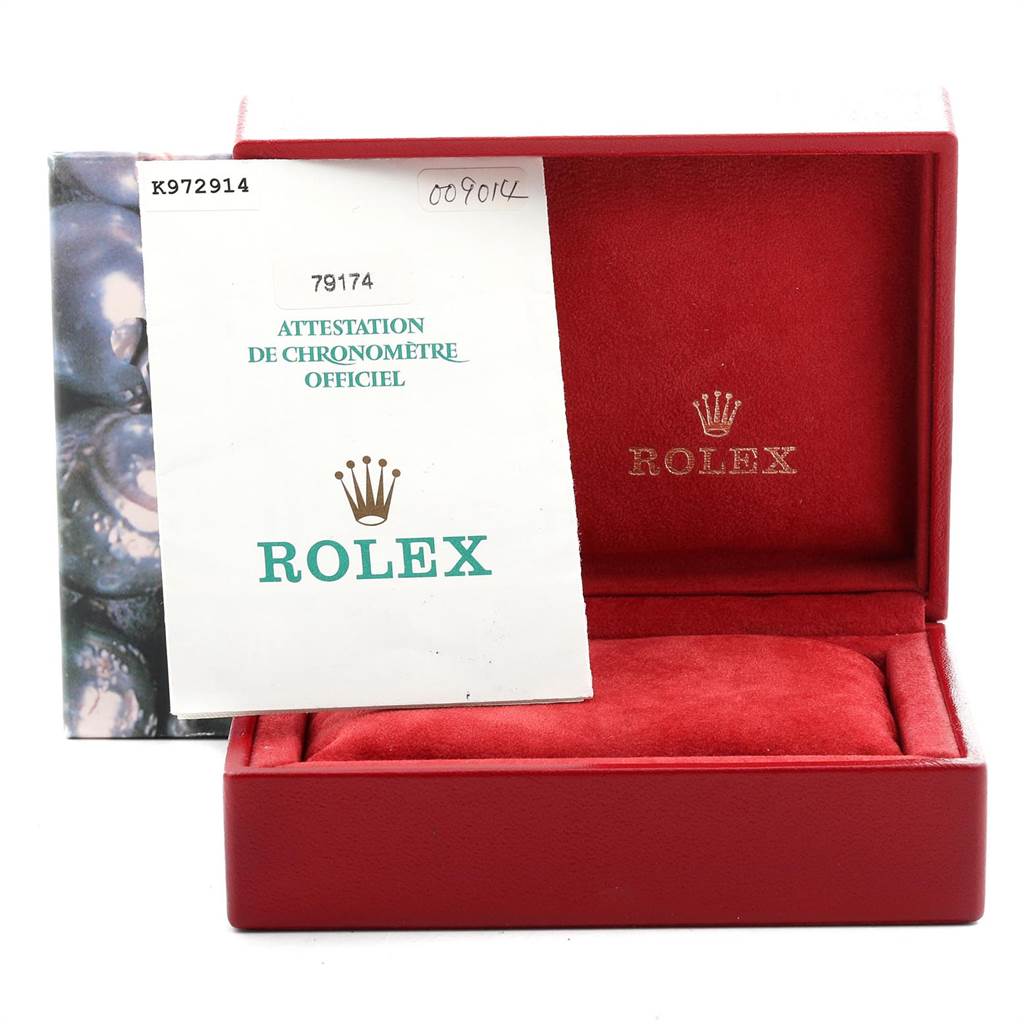 The image shows a Rolex Datejust 79174 Women's Stainless Steel Pink Dial 79174 Women's Stainless Steel Pink Dial watch box with official certification papers placed inside.