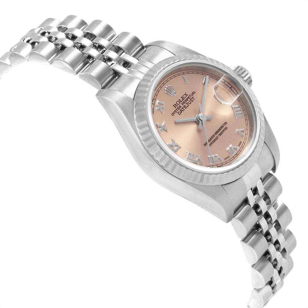 The Rolex Datejust 79174 Women's Stainless Steel Pink Dial 79174 Women's Stainless Steel Pink Dial watch is shown at an angled side view, showcasing the dial, bezel, crown, and part of the bracelet.