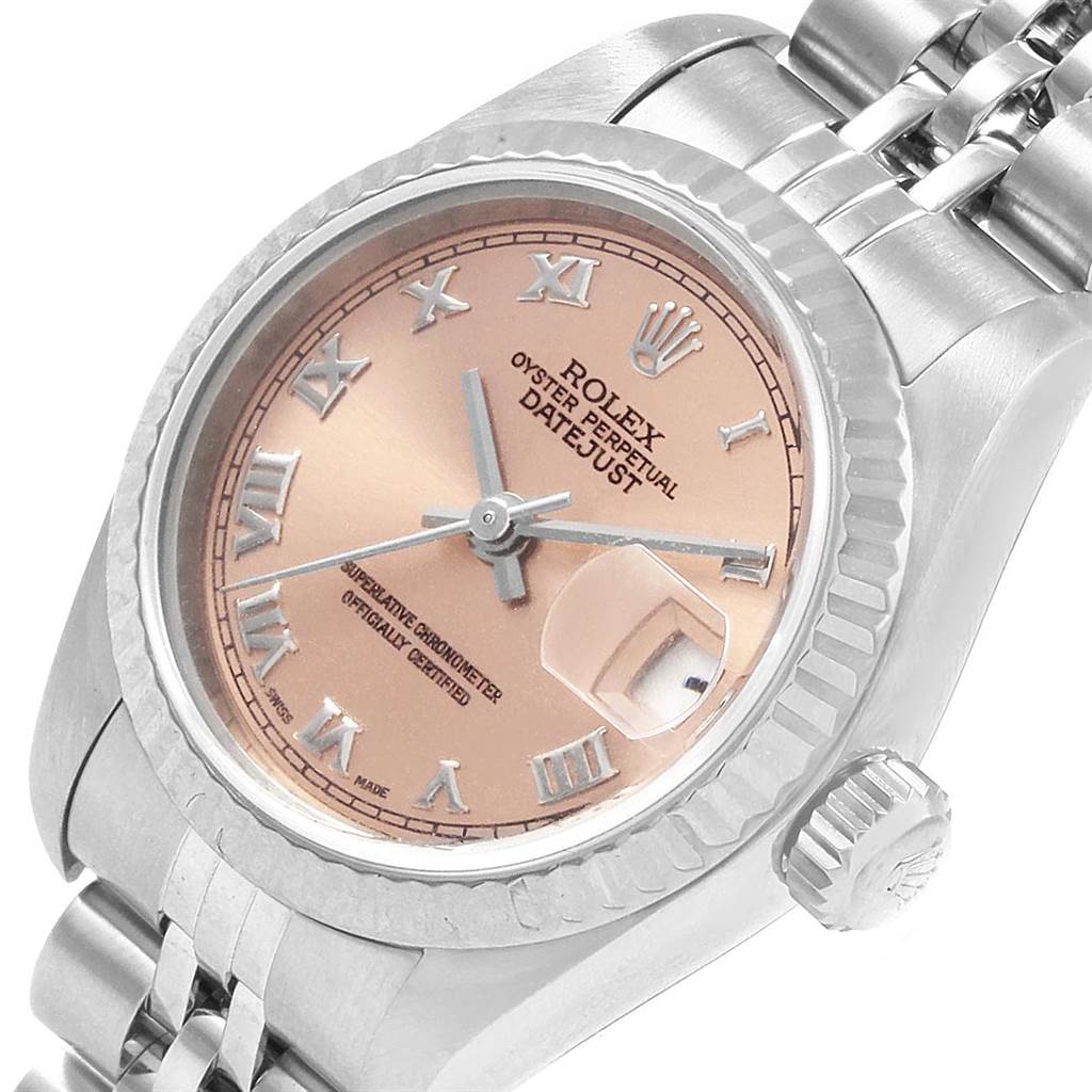 This is a close-up view of a Rolex Datejust 79174 Women's Stainless Steel Pink Dial 79174 Women's Stainless Steel Pink Dial watch showing the dial, bezel, crown, and part of the bracelet.