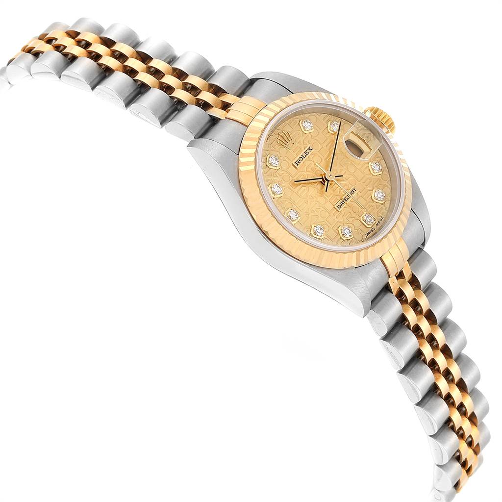 The image shows a Rolex Datejust 79173 Women's Stainless Steel Champagne Dial 79173 Women's Stainless Steel Champagne Dial watch from a side angle, highlighting its gold and silver bracelet, face, bezel, and crown.