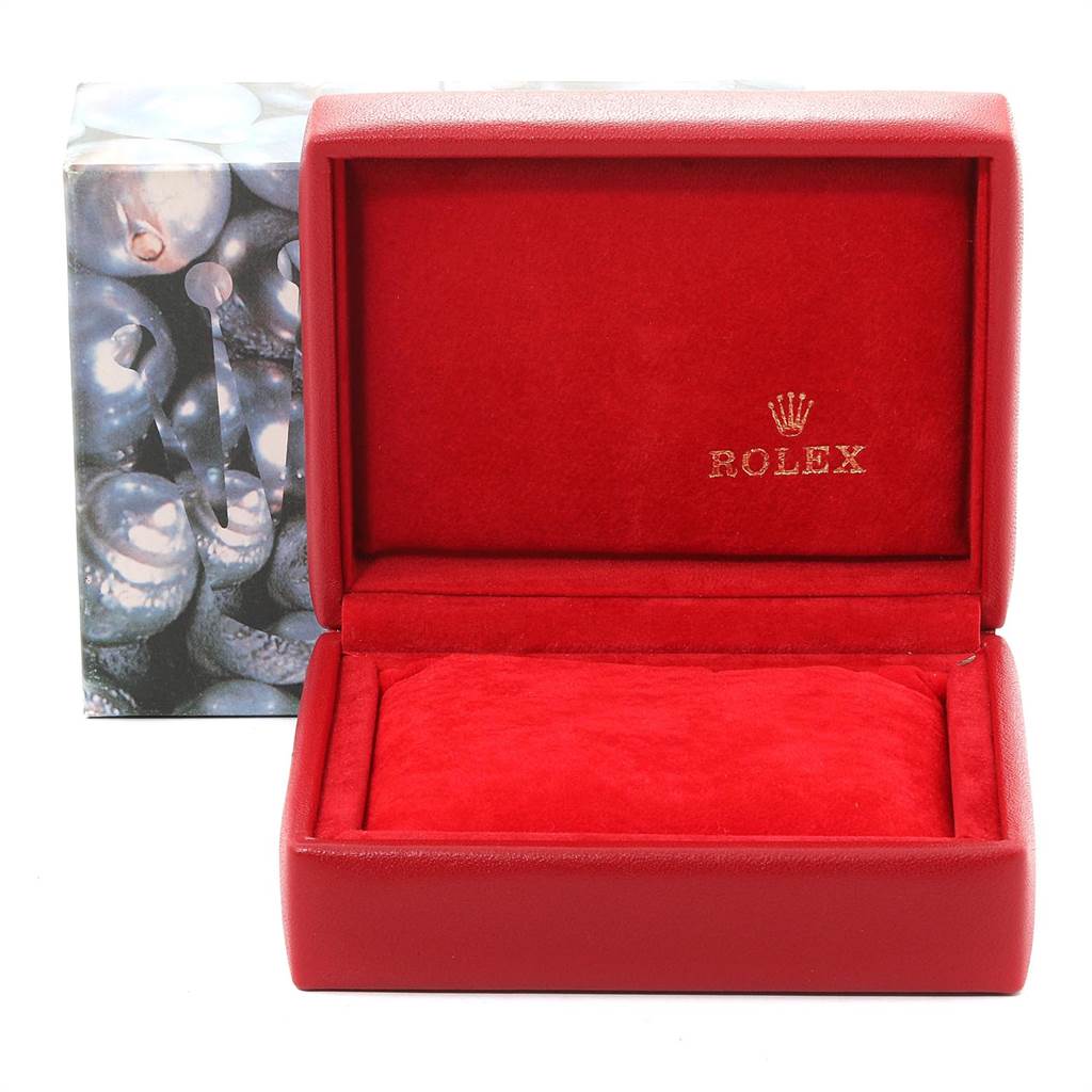 The image shows a red Rolex Datejust 79173 Women's Stainless Steel Champagne Dial 79173 Women's Stainless Steel Champagne Dial watch box with the brand logo inside the lid.