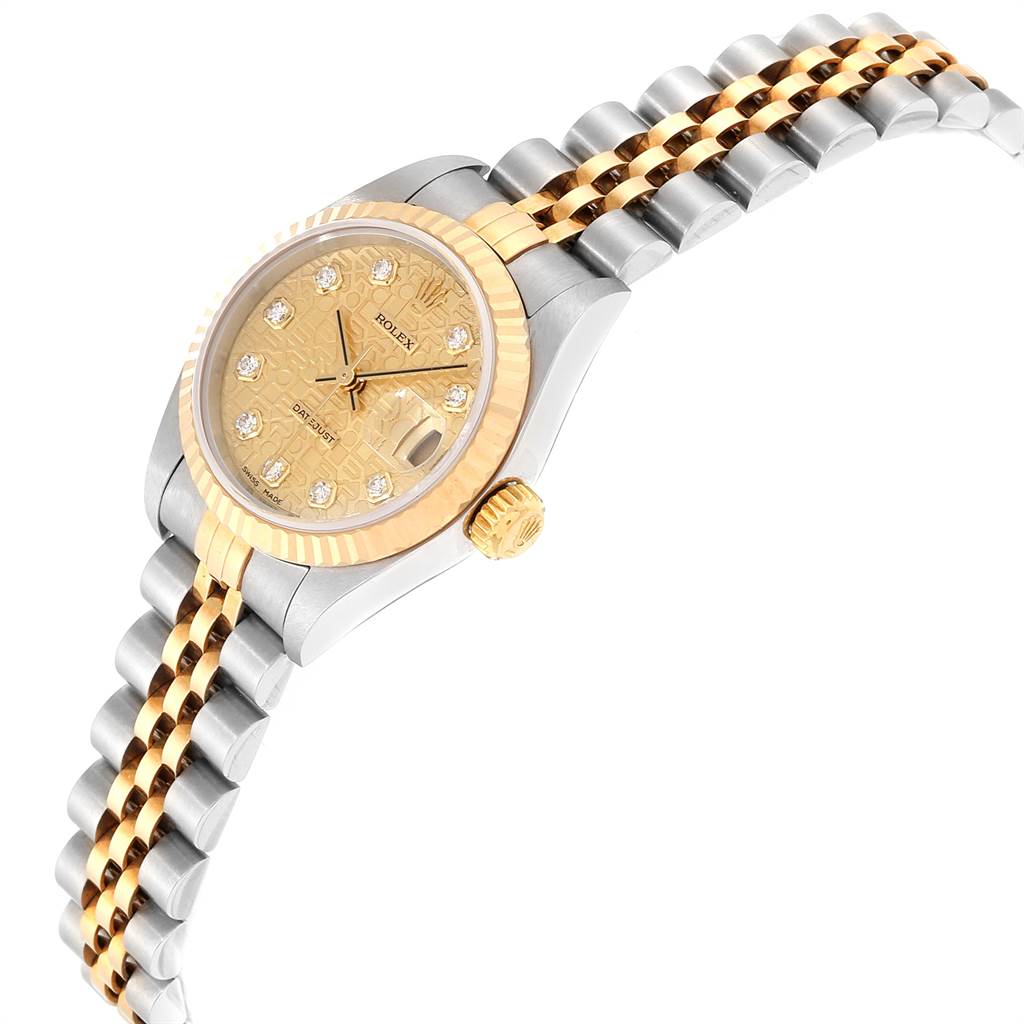 This Rolex Datejust 79173 Women's Stainless Steel Champagne Dial 79173 Women's Stainless Steel Champagne Dial watch is shown from an angle highlighting the face, bezel, crown, and metal bracelet.