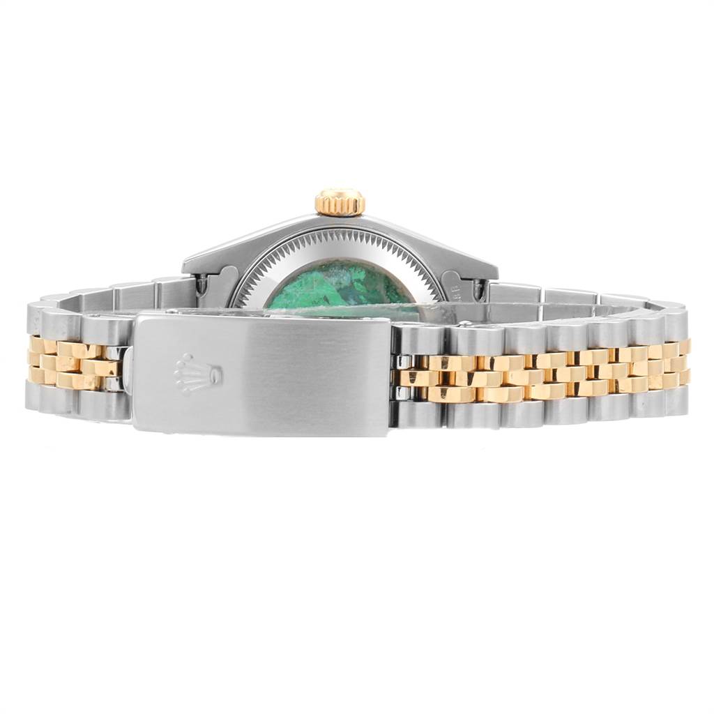 This image shows the back of a Rolex Datejust 79173 Women's Steel and Gold (two tone) Black Dial 79173 Women's Steel and Gold (two tone) Black Dial model with a focus on its two-tone bracelet and clasp.