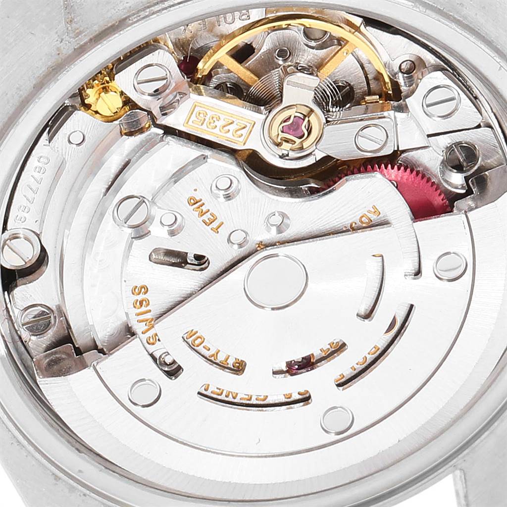 This image shows a close-up view of the movement mechanism inside a Rolex Datejust 79173 Women's Steel and Gold (two tone) Black Dial 79173 Women's Steel and Gold (two tone) Black Dial watch.