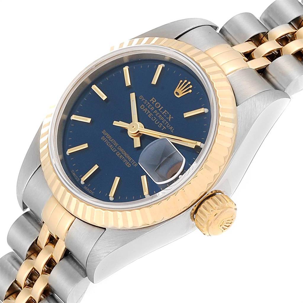 The image shows a close-up angled view of a Rolex Datejust 79173 Women
s Steel and Gold (two tone) Blue Dial 79173 Women
s Steel and Gold (two tone) Blue Dial watch, highlighting the dial, bezel, crown, and part of the bracelet.