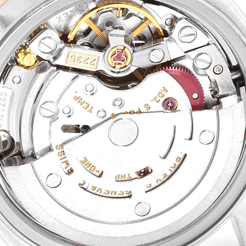 This image shows a close-up of the movement mechanism inside a Rolex Datejust 79173 Women
s Steel and Gold (two tone) Blue Dial 79173 Women
s Steel and Gold (two tone) Blue Dial watch.