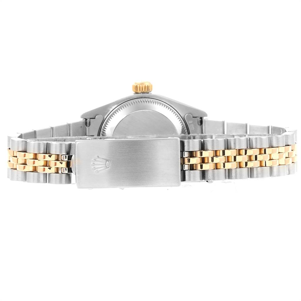 This image shows the back view of a Rolex Datejust 79173 Women
s Steel and Gold (two tone) Blue Dial 79173 Women
s Steel and Gold (two tone) Blue Dial watch, focusing on the stainless steel and gold bracelet and clasp.