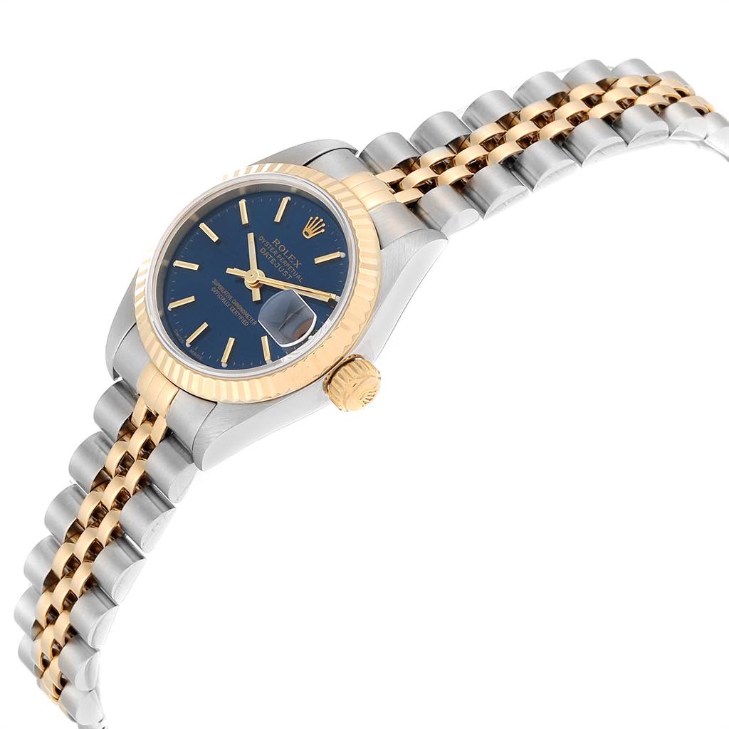 This image shows an angled view of a Rolex Datejust 79173 Women
s Steel and Gold (two tone) Blue Dial 79173 Women
s Steel and Gold (two tone) Blue Dial watch, highlighting its dial, bezel, and bracelet.