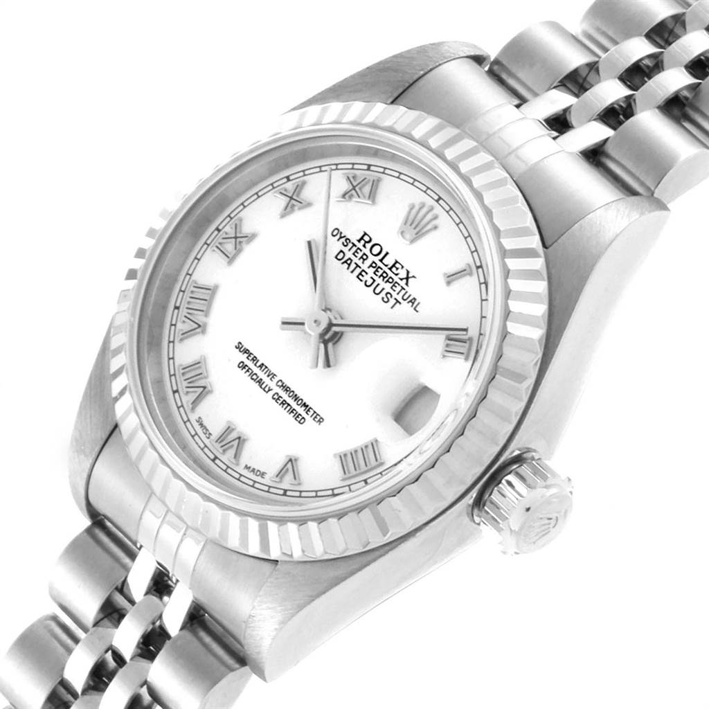 The image shows a Rolex Datejust 79174 Women's Stainless Steel White Dial 79174 Women's Stainless Steel White Dial watch from an angled side view highlighting the dial, bezel, crown, and part of the bracelet.