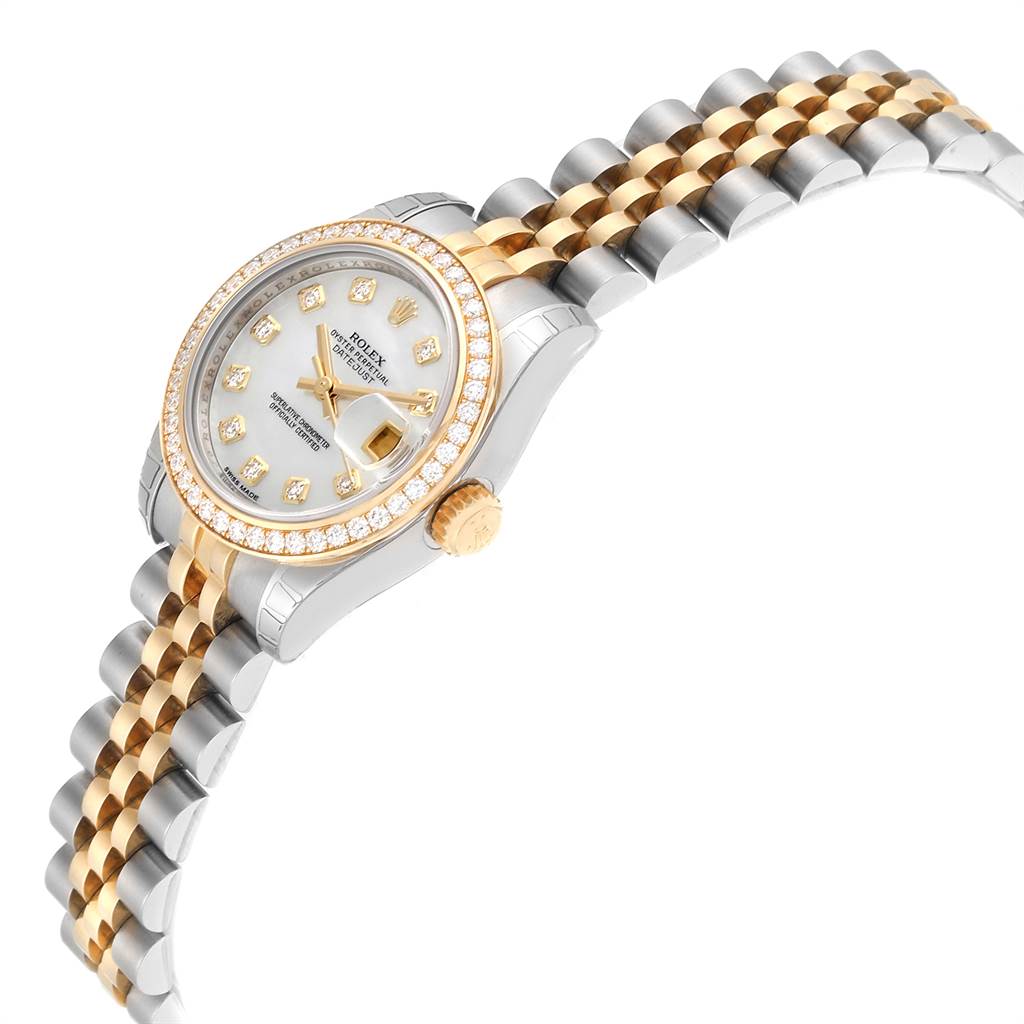The Rolex Datejust 179383 Women's Steel and Gold (two tone) Mother of Pearl Dial 179383 Women's Steel and Gold (two tone) Mother of Pearl Dial watch is shown at an angle emphasizing the face, bezel, crown, and part of the bracelet.
