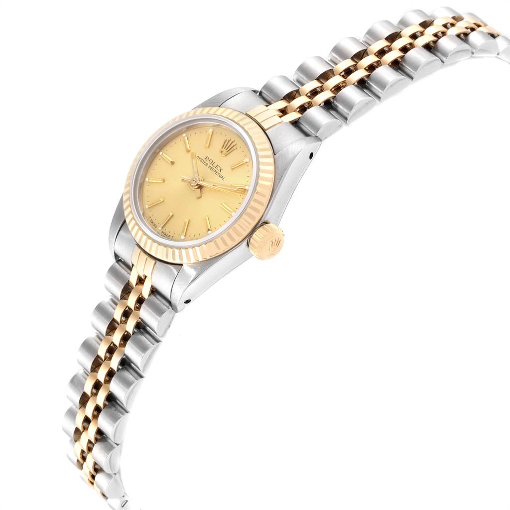 The image shows a side profile of a Rolex Datejust 67193 Women's Steel and Gold (two tone) Champagne Dial 67193 Women's Steel and Gold (two tone) Champagne Dial watch, highlighting the gold bezel, crown, champagne dial, and two-tone bracelet.