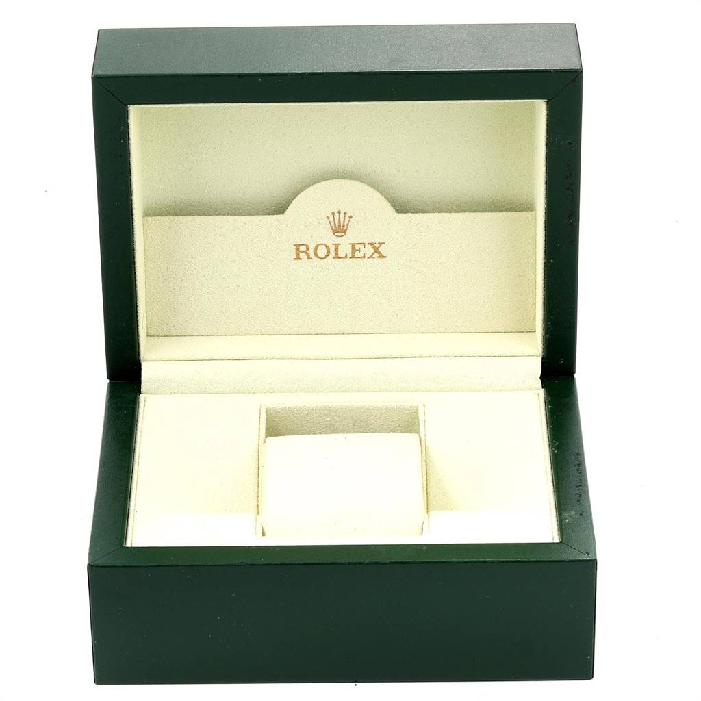 The image shows an empty Designer Rolex Datejust 179171 Women's Steel and Gold (two tone) Silver Dial 179171 Women's Steel and Gold (two tone) Silver Dial watch box with green exterior and cream interior padding.