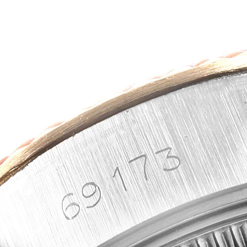 This image showcases the model number engraving (69173) on the edge of a Rolex Datejust 69173 Women's Stainless Steel White Dial 69173 Women's Stainless Steel White Dial watch, focusing on its case and part of the bezel.