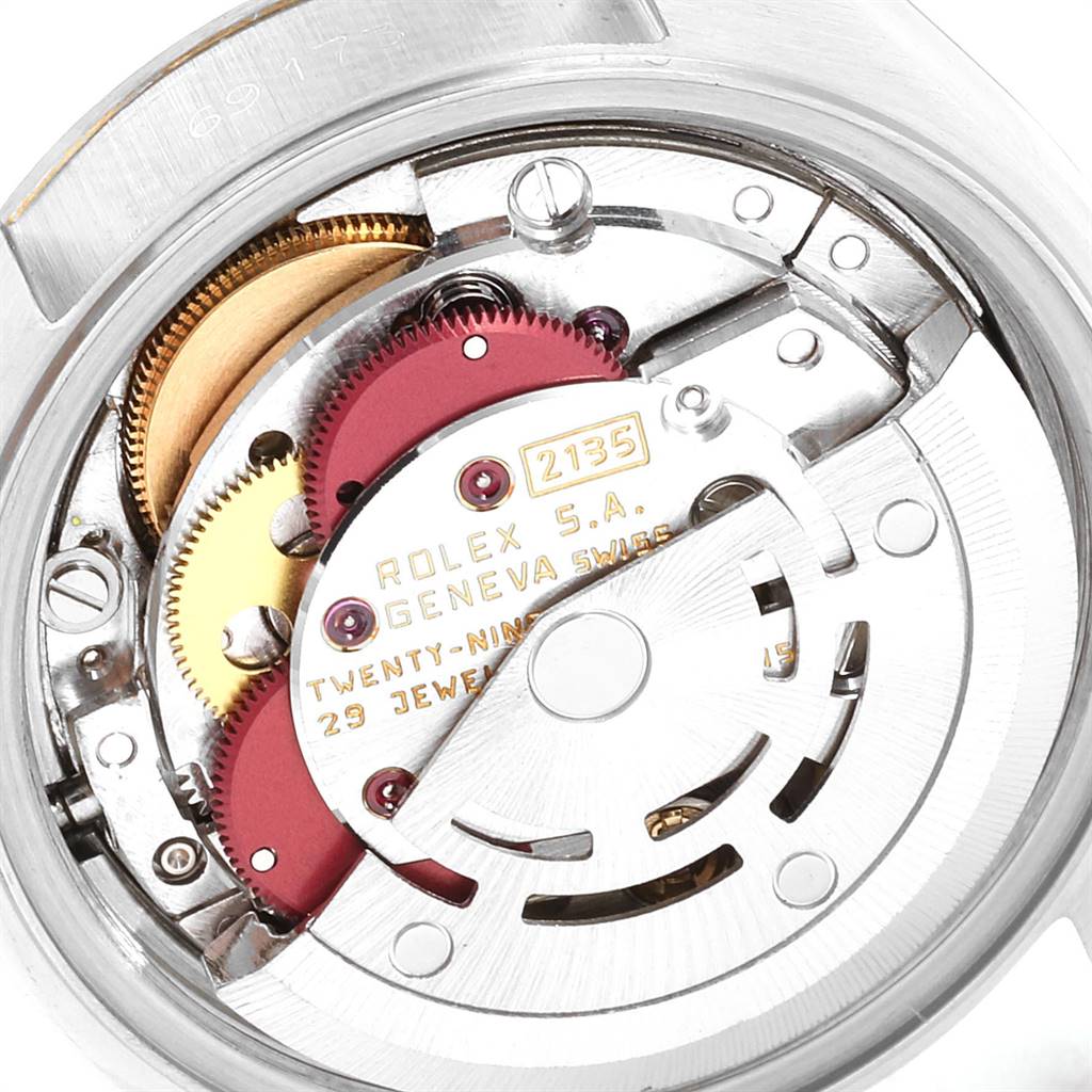 The image shows the movement and internal components of the Rolex Datejust 69173 Women's Stainless Steel White Dial 69173 Women's Stainless Steel White Dial watch from a close-up angle.
