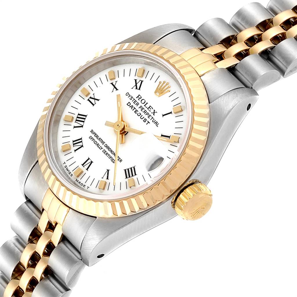 The image shows a close-up of a Rolex Datejust 69173 Women's Stainless Steel White Dial 69173 Women's Stainless Steel White Dial watch featuring its bezel, crown, dial, and part of the bracelet at an angled view.