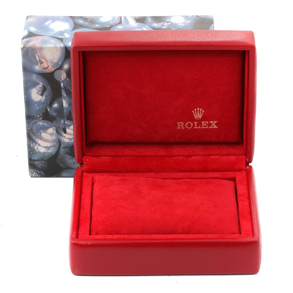 The image shows an empty, open Rolex Datejust 69173 Women's Stainless Steel Champagne Dial 69173 Women's Stainless Steel Champagne Dial watch box, featuring a red velvet interior with the Rolex logo on the inside lid.