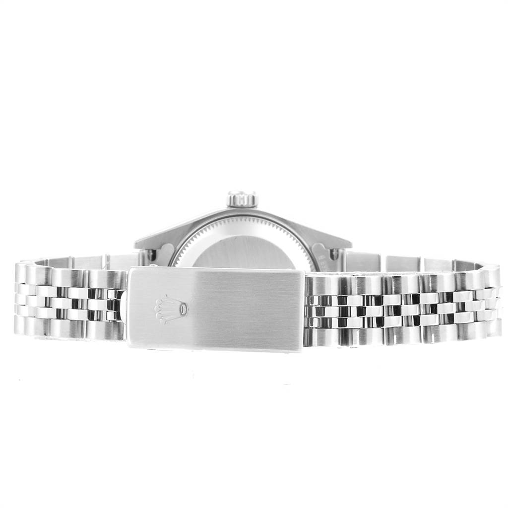 The image shows the back view of a Rolex Datejust 79174 Women's Stainless Steel Mother of Pearl Dial 79174 Women's Stainless Steel Mother of Pearl Dial watch, highlighting the jubilee bracelet and the clasp with the Rolex logo.