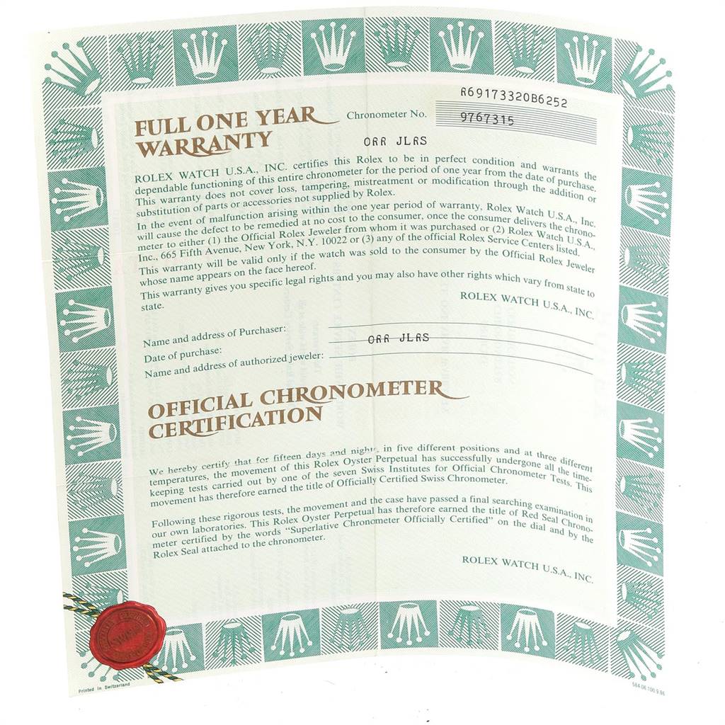 This image shows the warranty and chronometer certification for a Rolex Datejust 69173 Women's Stainless Steel Champagne Dial 69173 Women's Stainless Steel Champagne Dial watch.