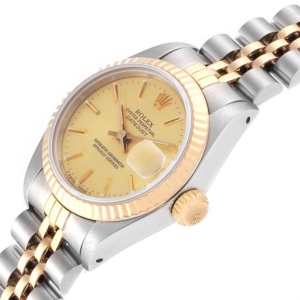The image shows a Rolex Datejust 69173 Women's Stainless Steel Champagne Dial 69173 Women's Stainless Steel Champagne Dial watch at an angled side view, highlighting the crown, bezel, and part of the bracelet.