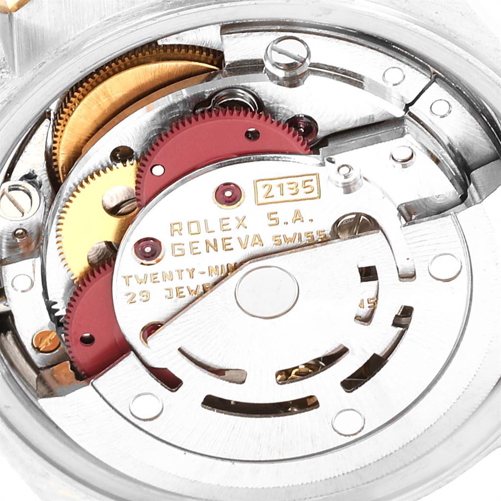 This image shows an up-close view of the movement mechanism of a Rolex Datejust 69173 Women's Stainless Steel Champagne Dial 69173 Women's Stainless Steel Champagne Dial watch.