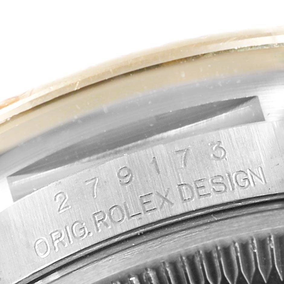 The image shows a close-up of the serial number and engravings on the case of a Rolex Datejust 279173 Women's Steel and Gold (two tone) Champagne Dial 279173 Women's Steel and Gold (two tone) Champagne Dial watch.