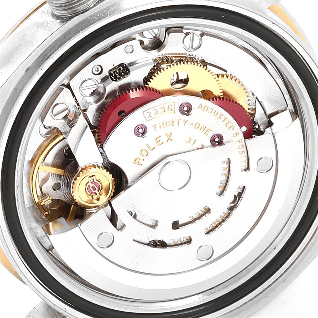 This image shows the Rolex Datejust 279173 Women's Steel and Gold (two tone) Champagne Dial 279173 Women's Steel and Gold (two tone) Champagne Dial watch movement, highlighting gears and internal mechanics from a back angle.