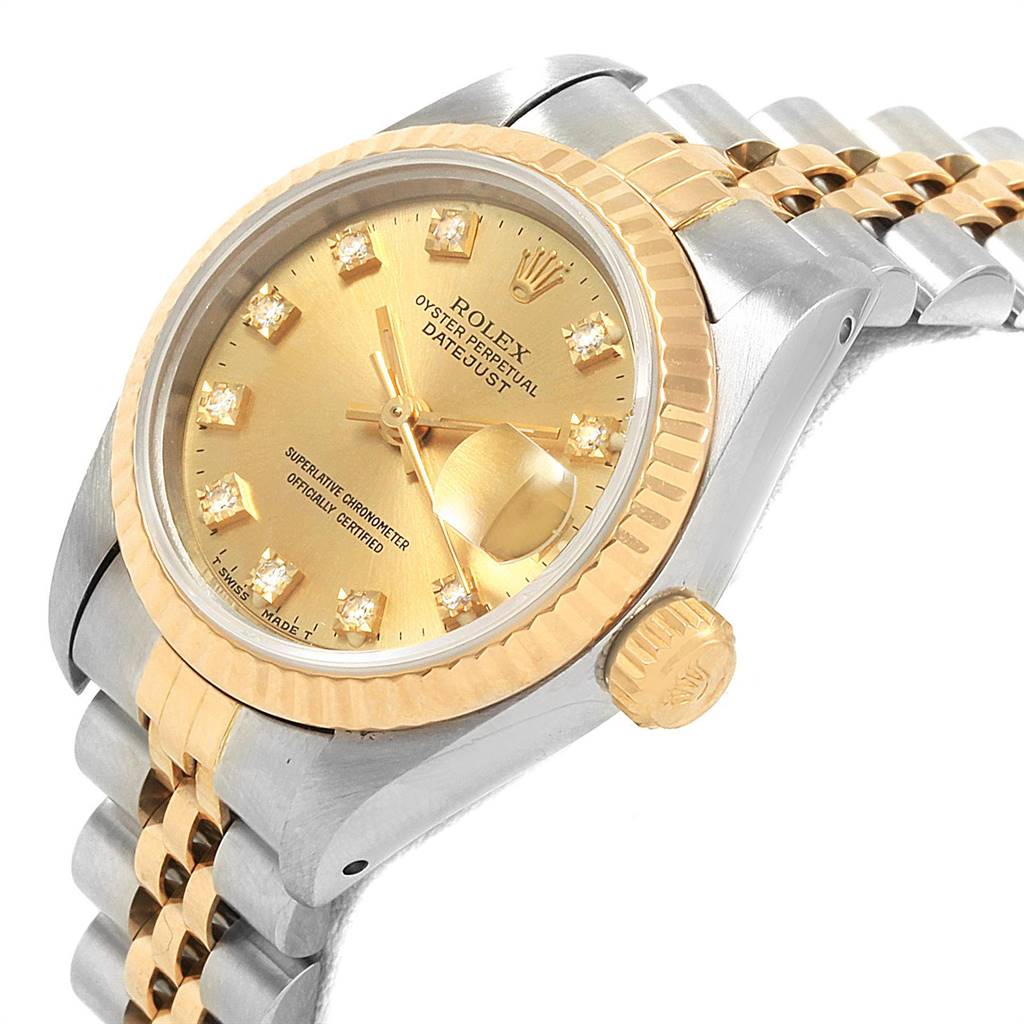 The Rolex Datejust 69173 Women's Stainless Steel Champagne Dial 69173 Women's Stainless Steel Champagne Dial watch is shown at an angle displaying its dial, bezel, crown, and part of its bracelet.