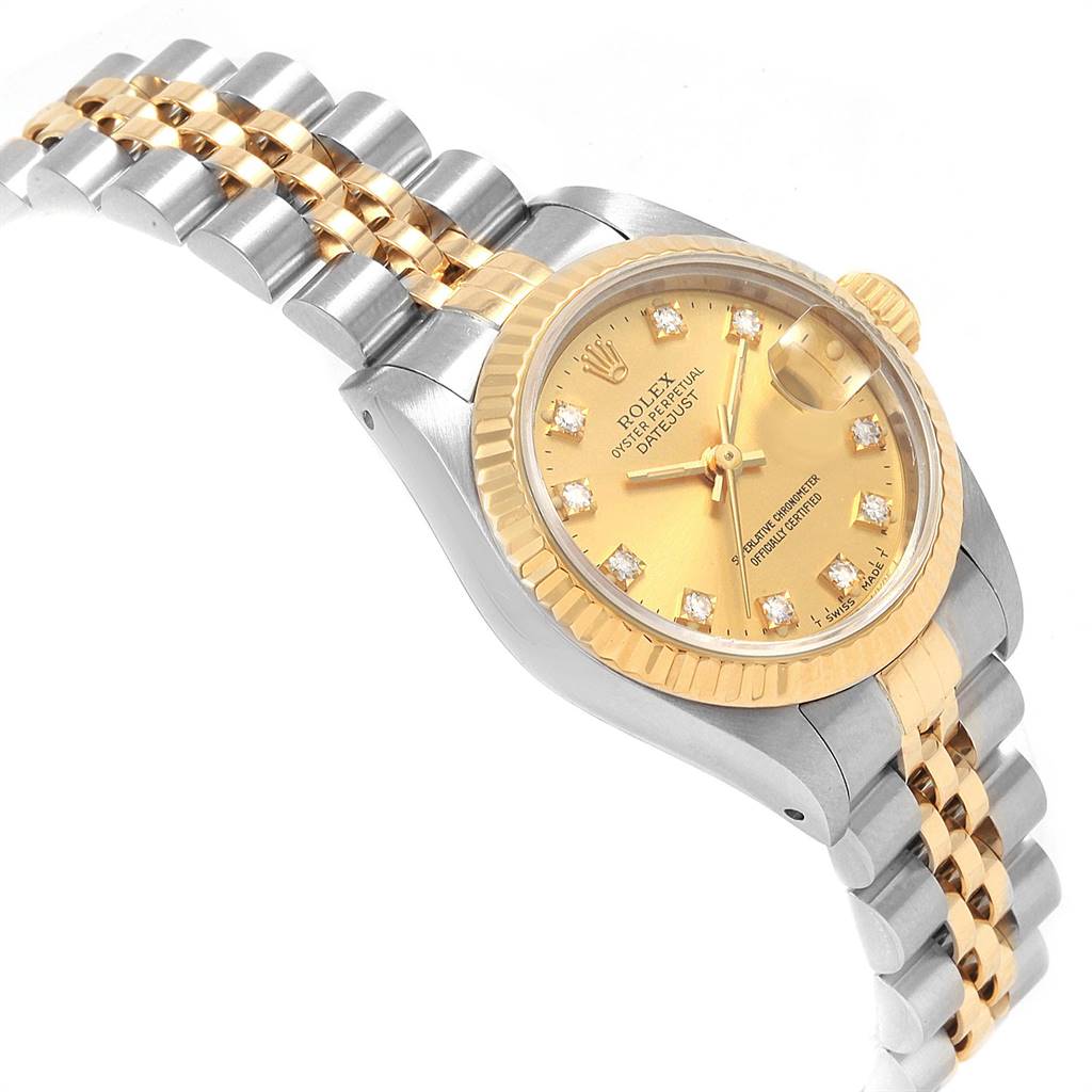 The Rolex Datejust 69173 Women's Stainless Steel Champagne Dial 69173 Women's Stainless Steel Champagne Dial watch is shown at an angle, showcasing its gold dial, bezel, and two-tone Jubilee bracelet.