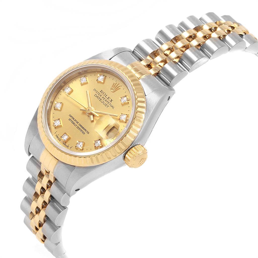 This image shows a Rolex Datejust 69173 Women's Stainless Steel Champagne Dial 69173 Women's Stainless Steel Champagne Dial watch from an angled side view, highlighting the dial, crown, and two-tone bracelet.