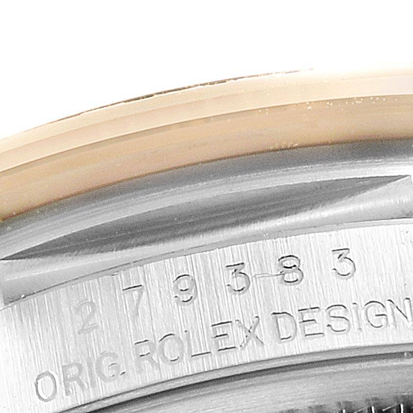 The close-up image shows the engraving on the side of the case back of a Rolex Datejust 279383 Women's Steel and Gold (two tone) White Dial 279383 Women's Steel and Gold (two tone) White Dial watch.