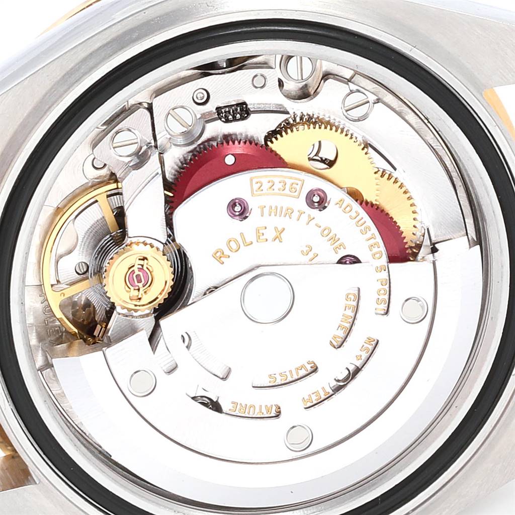 This is a close-up view of the movement mechanism inside a Rolex Datejust 279383 Women's Steel and Gold (two tone) White Dial 279383 Women's Steel and Gold (two tone) White Dial watch.