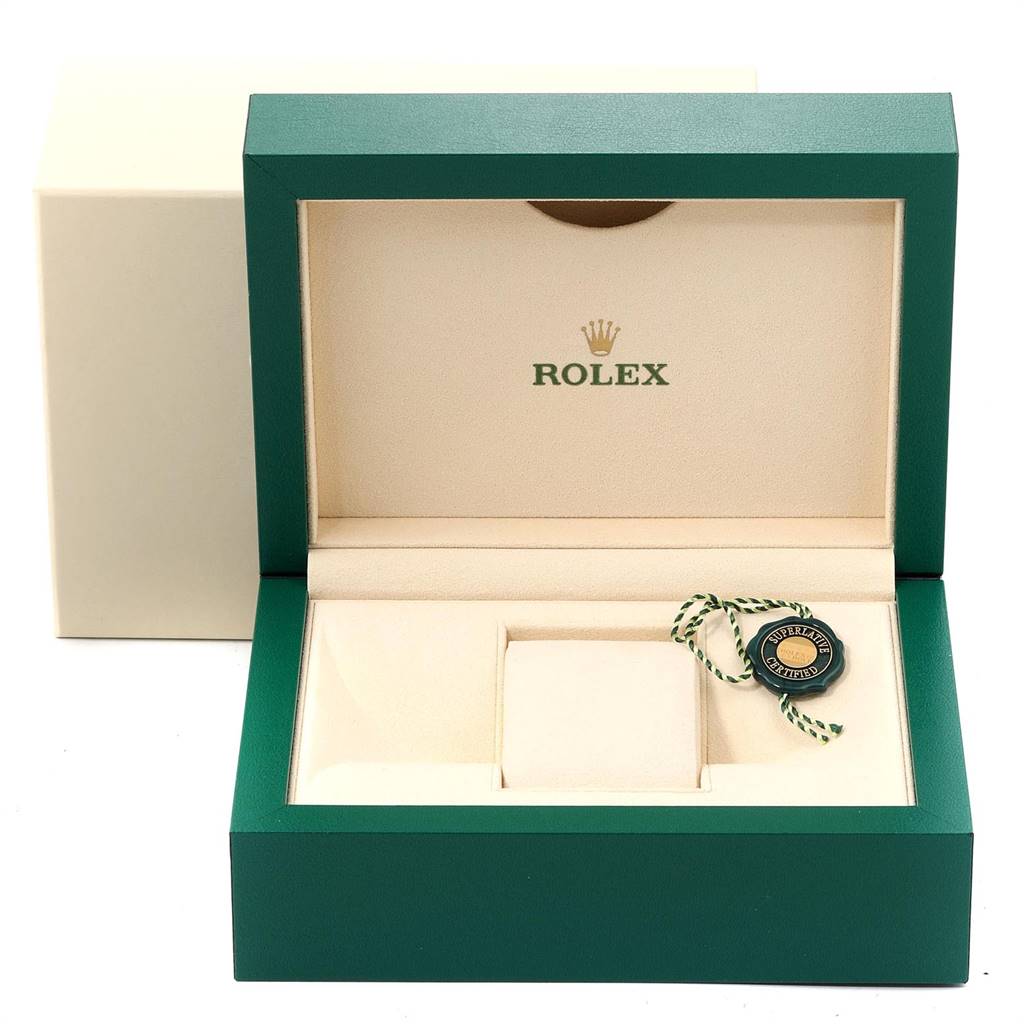 This image shows an open green and beige Rolex Datejust 279383 Women's Steel and Gold (two tone) White Dial 279383 Women's Steel and Gold (two tone) White Dial watch box with a certification tag inside.