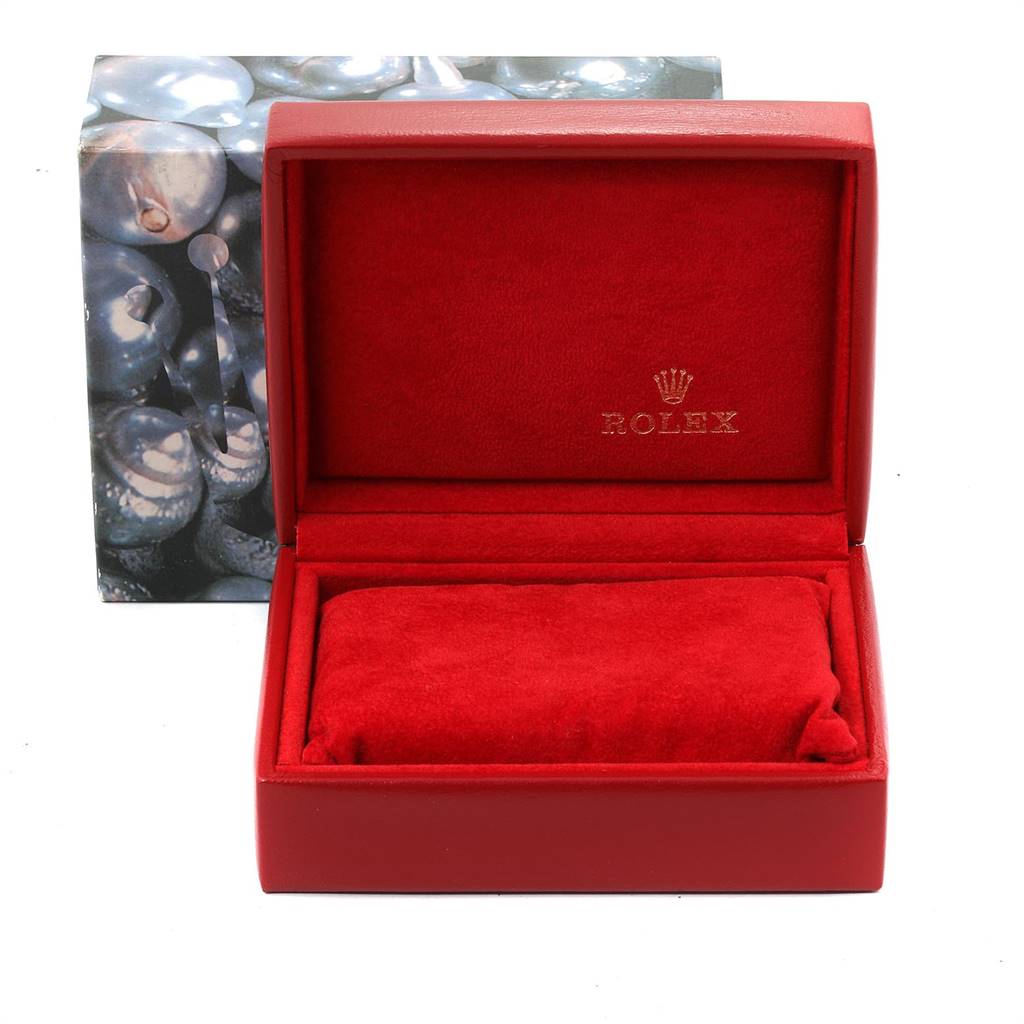 The image shows a red Rolex box, open, with a cushion inside, presumably for a Rolex Datejust 69173 Women's Stainless Steel Black Dial 69173 Women's Stainless Steel Black Dial watch.