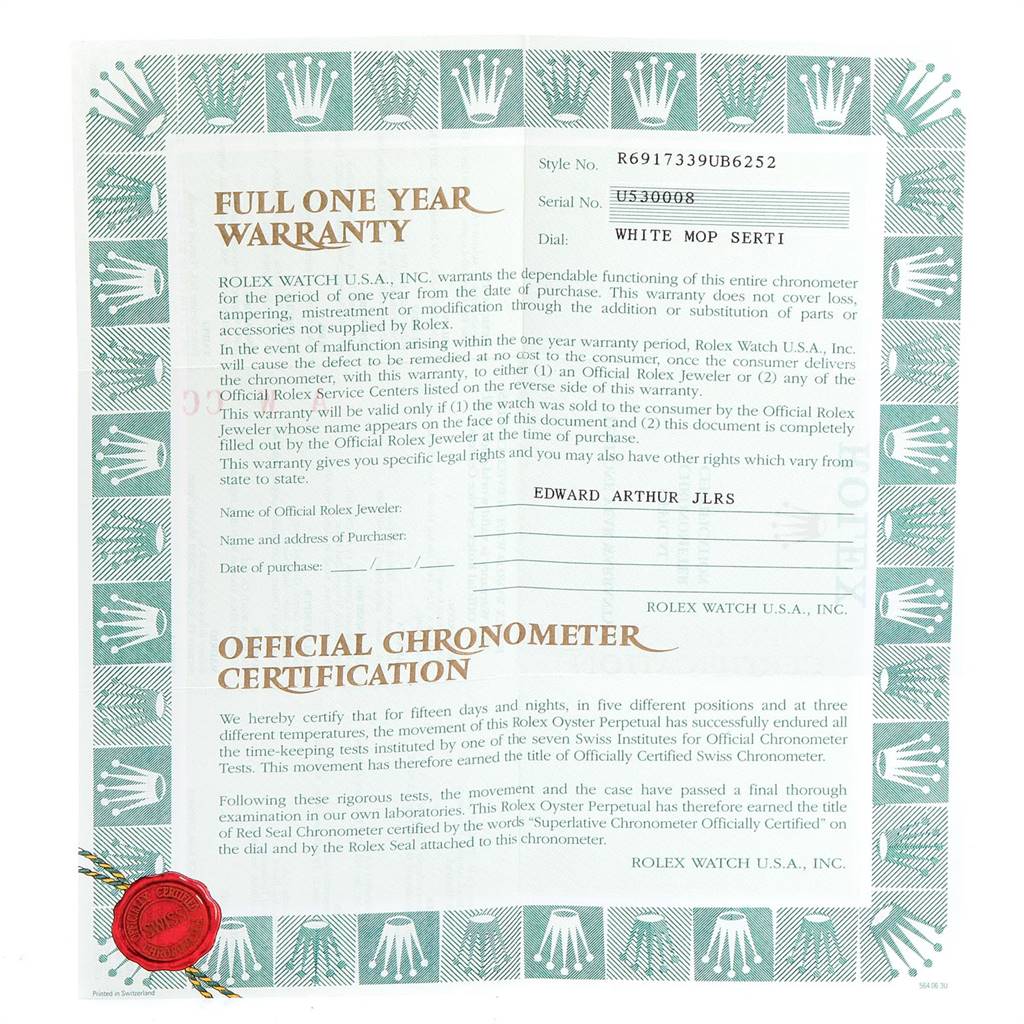 This image shows the warranty and certification papers for a Rolex Datejust 69173 Women's Stainless Steel Mother of Pearl Dial 69173 Women's Stainless Steel Mother of Pearl Dial model watch.