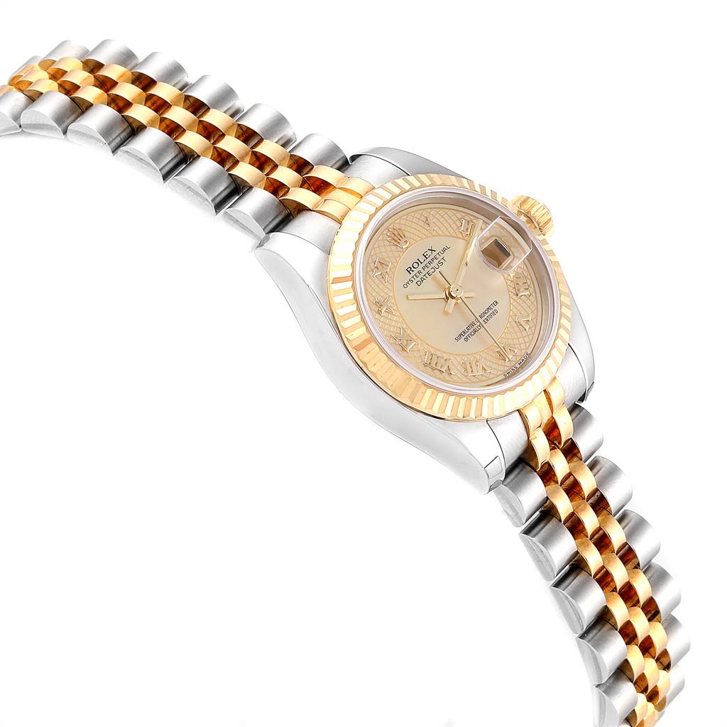 The Rolex Datejust 179173 Women
s Steel and Gold (two tone) Mother of Pearl Dial 179173 Women
s Steel and Gold (two tone) Mother of Pearl Dial watch is shown at a slight side angle, revealing the dial, fluted bezel, and two-tone bracelet.