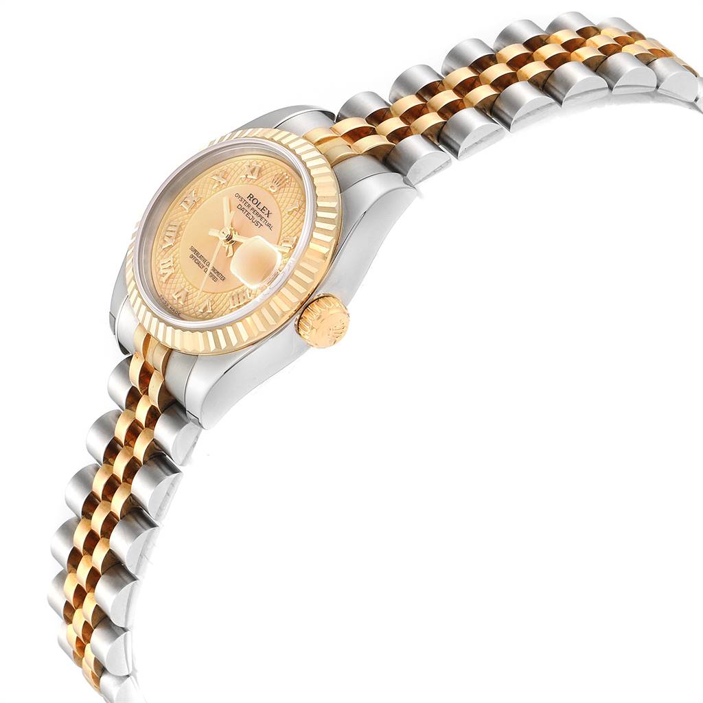 The image shows a side view of a Rolex Datejust 179173 Women
s Steel and Gold (two tone) Mother of Pearl Dial 179173 Women
s Steel and Gold (two tone) Mother of Pearl Dial watch displaying its gold bezel, crown, and two-tone bracelet.